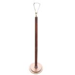 A mahogany standard lamp with tapering ribbed column on circular stepped base. (60in)