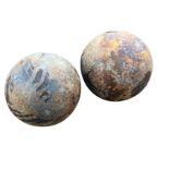 A pair of cast iron canon balls. (5.5in) (2)