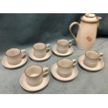 A Denby stoneware six-piece coffee set, with an associated coffee pot, the cups with ribbed