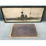 A framed C20th photograph of the famous battleship HMS Queen Elizabeth; and Janes Fighting Ships,