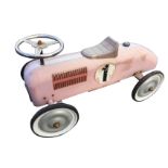 A childs tin racing car with front wheel steering mechanism. (28.5in)