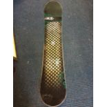 A waisted modern snowboard by Ride from the compact series, with cleave edge and hybrid glass