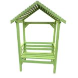 A painted garden bower with slatted pitched roof on square column supports, the bench with