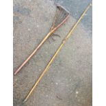An Ayers Ltd hardwood longbow with carved horn terminals; and a Hattersley hardwood lacrosse stick