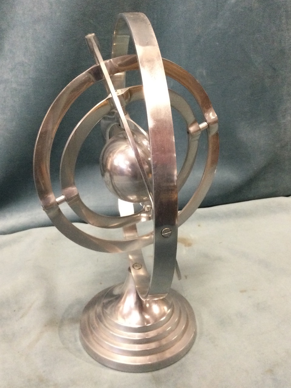 An aluminium armillary sphere on circular stepped stand; a square handpainted terracotta - Image 3 of 3