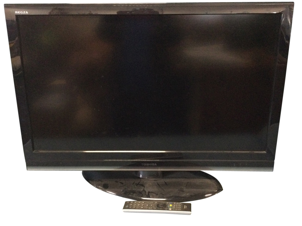 A large Toshiba flatscreen TV with remote - working. (35.25in x 25.5in)