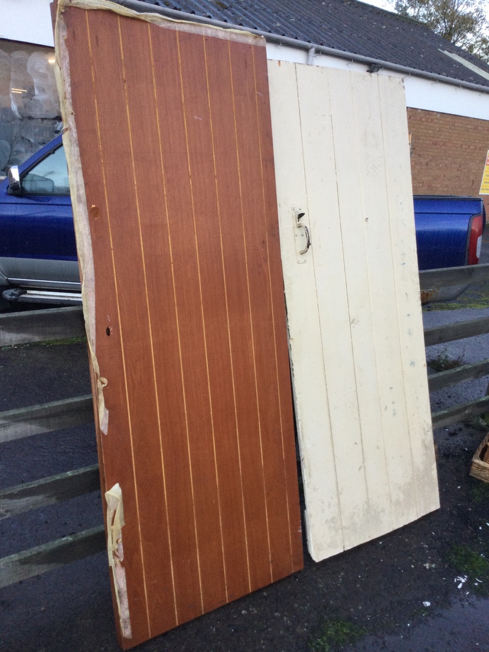 A painted rectangular batten door mounted with suffolk latch - 31in x 77.5in; and a modern - Image 2 of 3