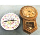 A small oak cased drop-dial wallclock with dial under convex glass with brass bezel; and a