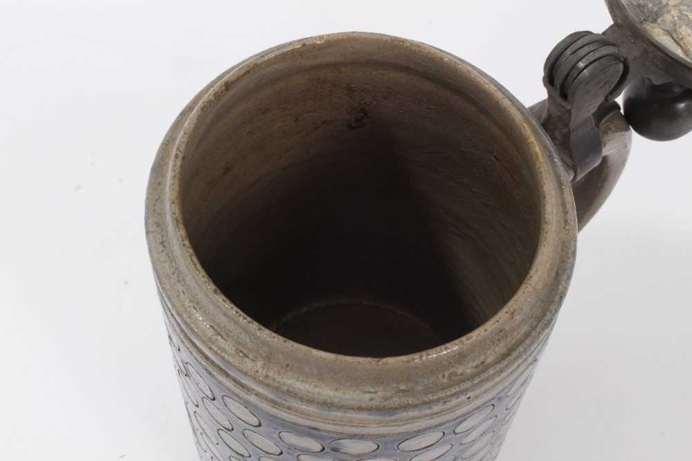 An 18th Century Westerwald stoneware tankard, with hinged pewter cover - Image 5 of 7