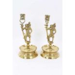Pair of 19th century Nuremberg style brass figural St Christopher candlesticks