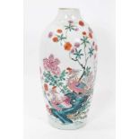 Antique Chinese Qing period semi-eggshell porcelain vase with a textured surface, decorated in a fam