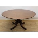 Large circular mahogany dining table