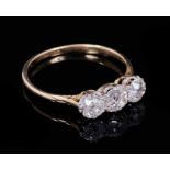 Antique diamond three stone ring with three old cut diamonds in claw setting on 18ct yellow gold sha