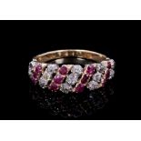 Regency diamond and ruby ring with alternating rows of old cut diamonds and mixed cut rubies in gold