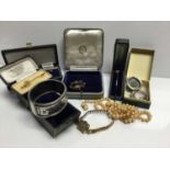Smokey quartz brooch, two stick pins, silver bangle, jewellery boxes