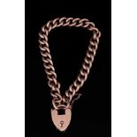 Edwardian 9ct rose gold curb link bracelet with padlock clasp, 18-19cm length.