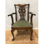 Mid 18th century and later walnut elbow chair, possibly Irish.