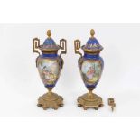Pair of 19th century Continental ormolu mounted porcelain vases and covers