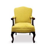 18th century style mahogany framed elbow chair with yellow spotted upholstery