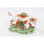 Late 18th century Derby porcelain model of a Pointer, shown mid-stride on a grassy base, 16cm length