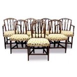Set of eight Regency mahogany dining chairs, each with pierced vertical splat back and floral patter
