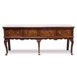 Fine and rare early 18th century yew wood low dresser, with moulded top of four frieze drawers, on w
