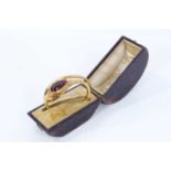 Victorian gold and cabochon garnet snake bangle in original box
