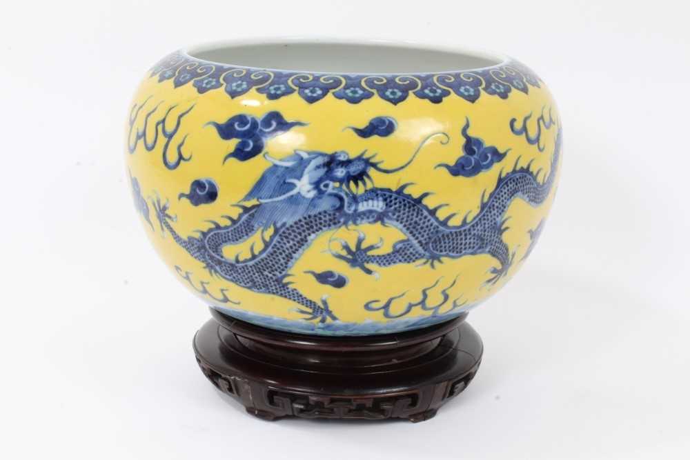 Chinese porcelain bowl with dragon decoration on a yellow ground