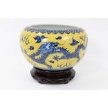 Chinese porcelain bowl with dragon decoration on a yellow ground