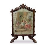 19th century Black Forest carved fire screen
