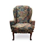 Early 18th century walnut wing armchair