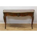 A good quality 19th century Continental rosewood and kingwood serpentine fronted table with ormolu m