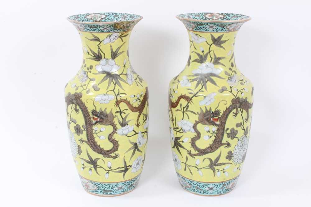 Pair 19th century Chinese Dayazhai-style porcelain baluster vases, decorated with dragons amongst fl