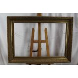 Early 19th century gilt and gesso frame, internal size 61cm x 91cm, overall size 80cm x 111cm