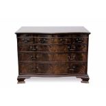 Late 19th / early 20th century mahogany serpentine fronted chest of bold proportions