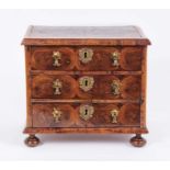 Fine William and Mary style walnut and oyster veneered miniature chest of drawers
