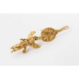 Antique or possibly ancient gold earring, modelled as Eros or Cupid, the winged figure suspended fro