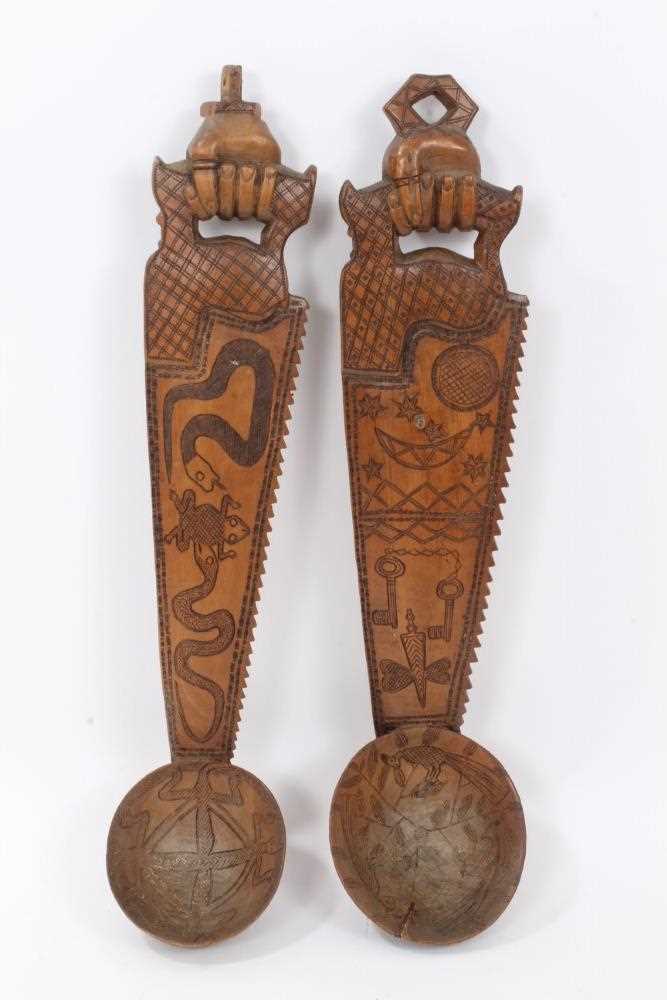 Pair of African carved wooden ladles