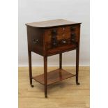 Regency mahogany and tulipwood crossbanded work table, with rounded rectangular hinged top and faux