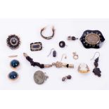 Group of antique jewellery to include three mourning brooches, lava cameo brooch and other items
