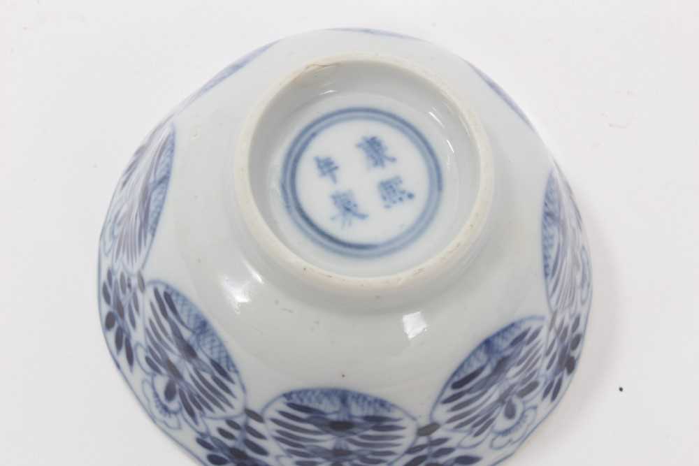 An 18th century Chinese blue and white tea bowl, a beaker and a bowl - Image 16 of 16