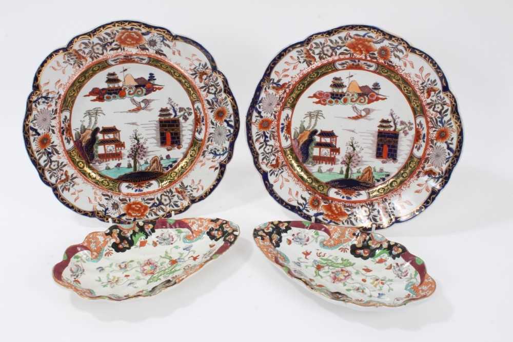 An unusual pair of Masons Ironstone shell shaped dishes, and a similar pair of plates