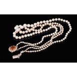 Cultured pearl necklace with a string of graduated cultured pearls measuring approximately 3mm - 6mm