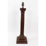 Early 20th century carved oak Corinthian column table lamp, on square stepped base, 59cm high