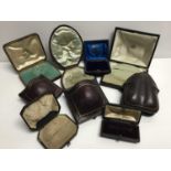 Eight antique leather jewellery boxes for earrings and brooches