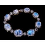 Moonstone and diamond bracelet with eight graduated oval moonstone cabochons surrounded by single cu
