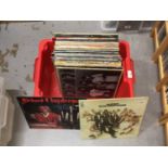 LP records including The Beatles, AC/DC, Alice Cooper and Carly Simon