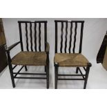 1920s children's rush seated carver chair, together with another similar (2)