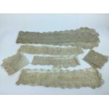 A collection of Antique lace including two Maltese silk lace lappets and handkerchiefs, Irish croch