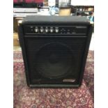 Carlsbro Bass Bomber amplifier together with a small Squier practise amp